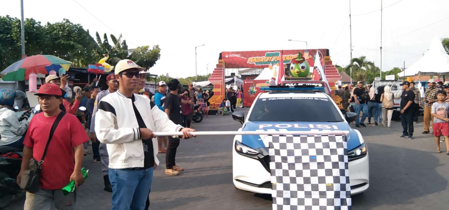 KPU Sidoarjo Sambut Kirab Maskot SIJALIH dari Kabupaten Pasuruan, Selanjutnya Maskot GUK KASIJO Akan Diarak Keliling Sidoarjo.